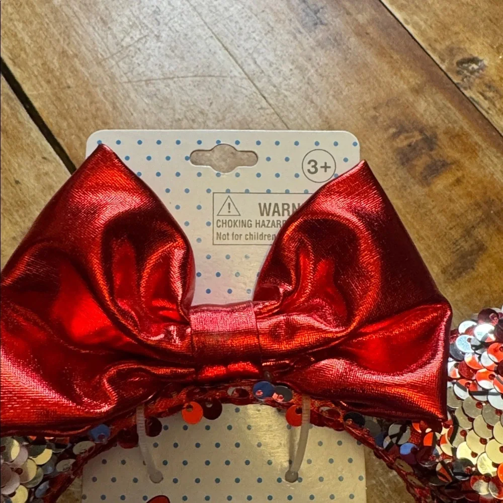 Disney Minnie Mouse Sparkling Red Sequin Ears with bow new in package never worn